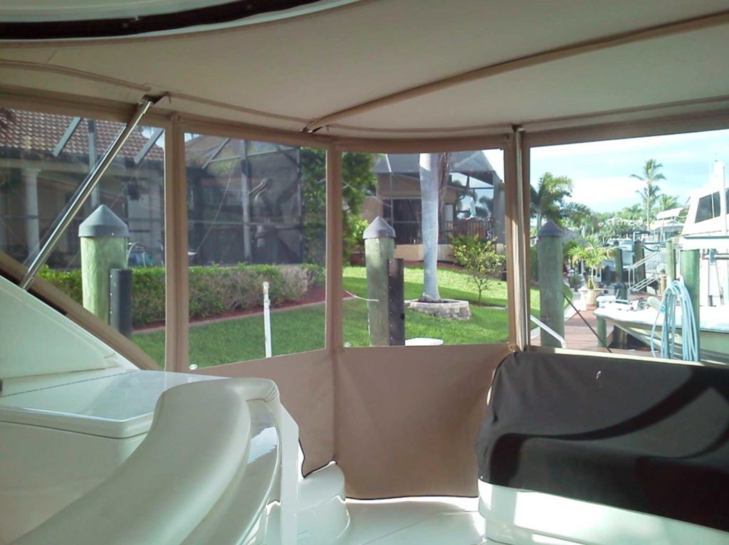 Inside view of one of our beige Rainier Marine canvas enclosures with Rainier Marine boat windows inside.