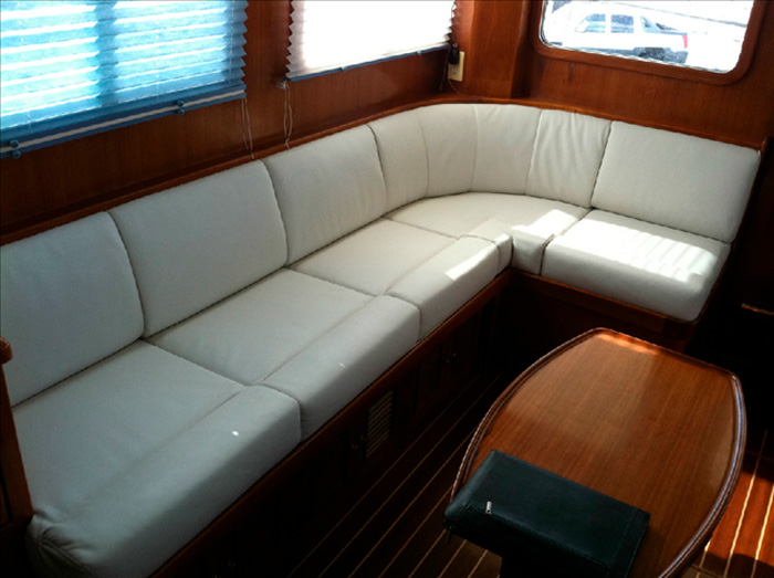 Custom couch marine upholstery for a boat that has wood interior.